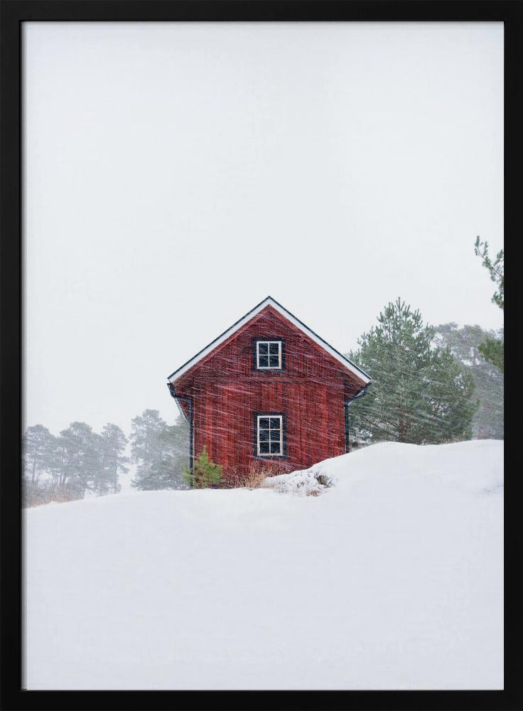 Old red house during snowstorm | Poster