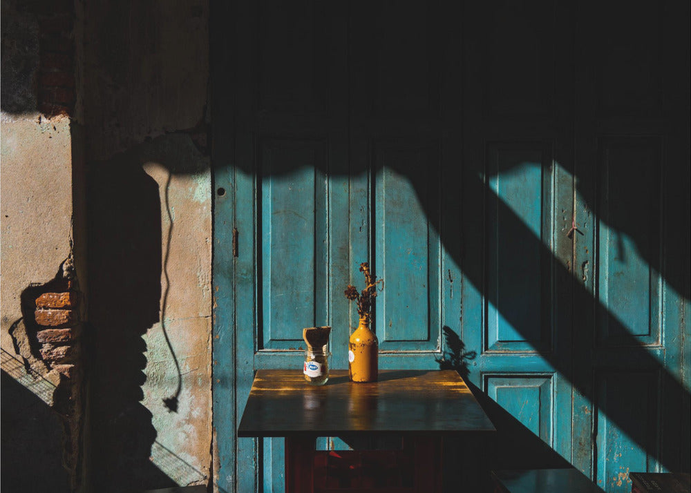 Empty table at cafeteria on the street side | Poster